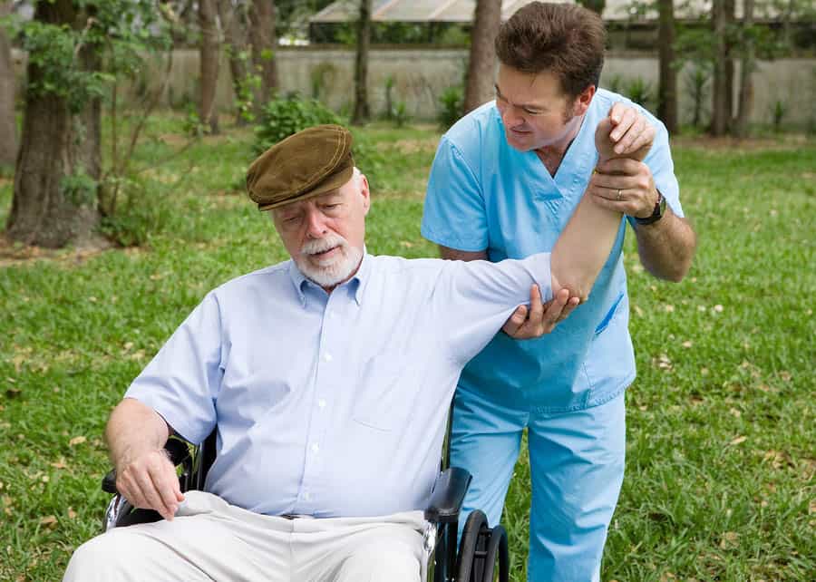 This is a photograph of an older adult receiving home health care. 