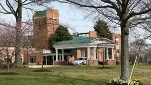 This is an external photograph of The Village at Rockville nursing home, located in Montgomery County, Maryland. 